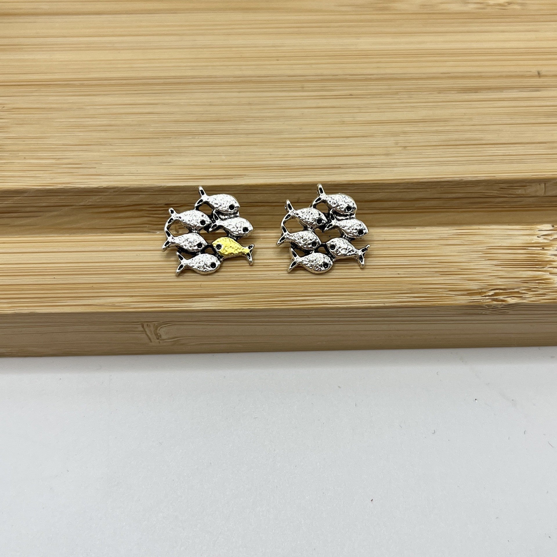 A Group Of Small Goldfish Countercurrent Ear Studs