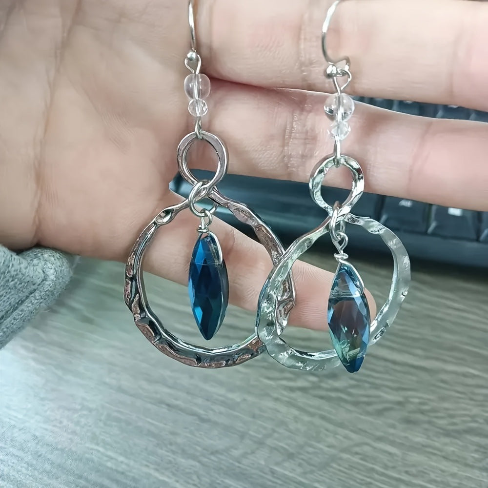 A Pair Of Retro Beating Winding Moonstone Eardrops